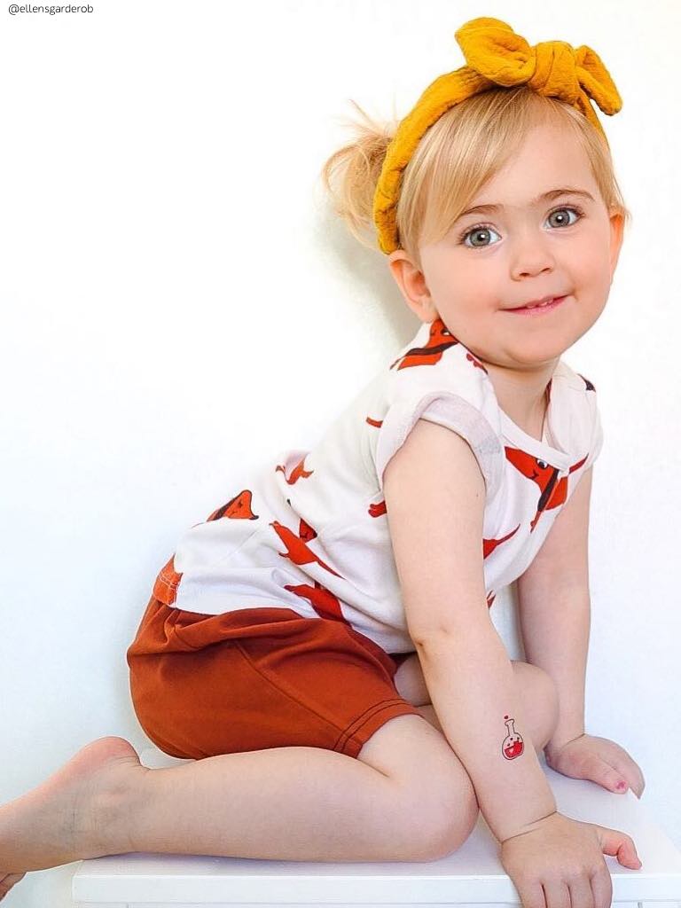 Love poison tiny temporary tattoos from All you need is love tattoo set by Ducky street