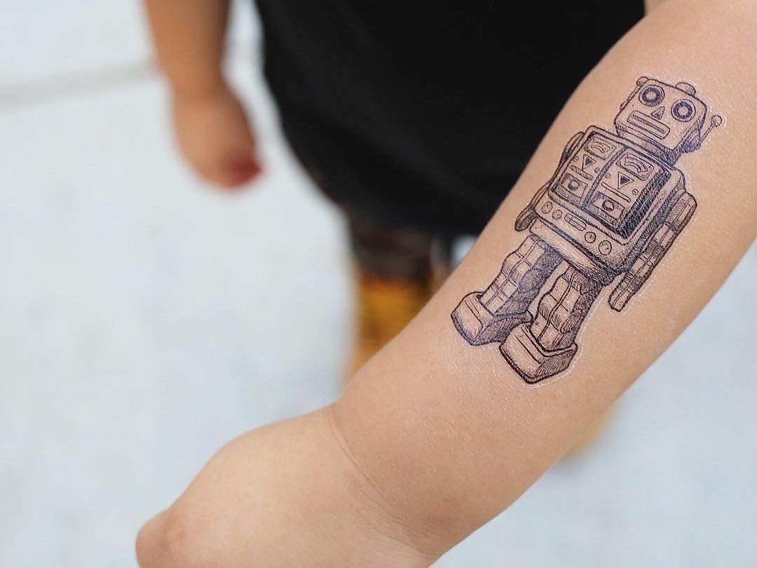 Robot Tattoo | i just wonder what kind of guy gets this as a… | Flickr