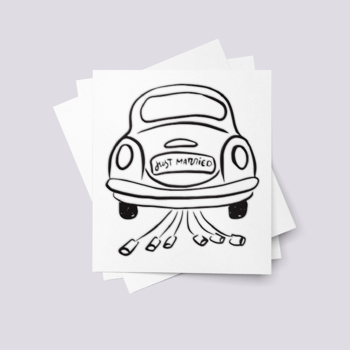 Temporary tattoo of a wedding car decorated with 'Just Married' sign and tin cans.