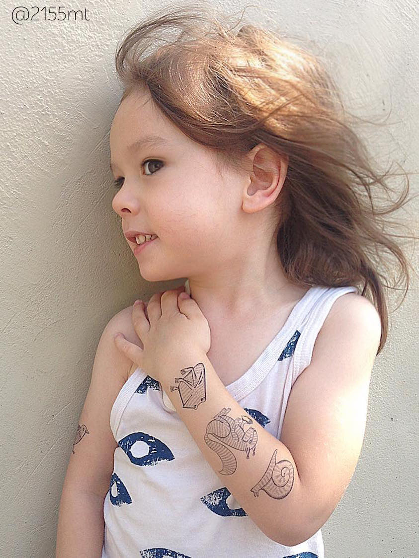 Frog, squirrel and snail black ink temporary tattoos from big fake tattoos set Animals by Ducky street.