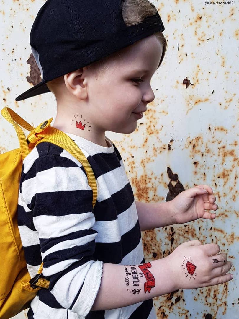 Hiqgh quality All you need is love temporary tattoos in romantic doodle style by Ducky street