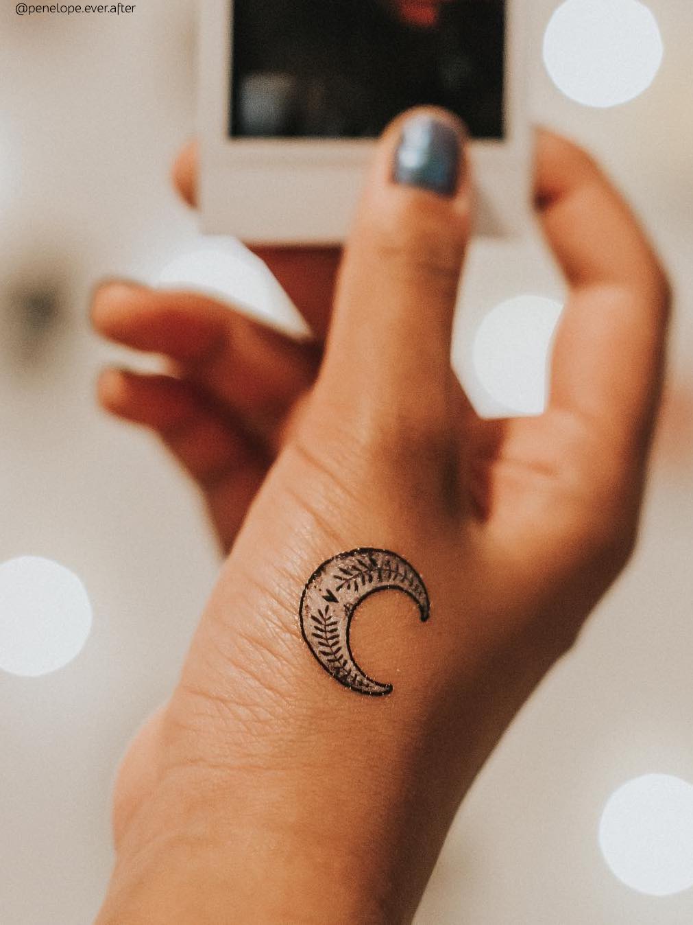 Minimalist Crescent Moon Tattoo on Wrist