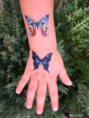 Beautiful shades of blue. Butterflies temporary tattoos for Girls birthday parties from Duckystreet.