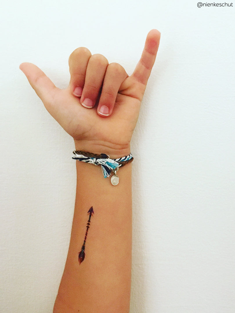 Little Tattoos — Crossed arrows and initials.