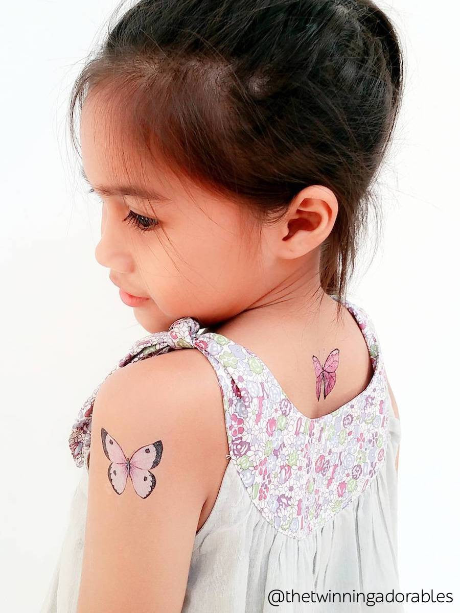 Pink butterfly temporary tattoo from Butterflies kids tattoo set of 21 watercolor butterflies.